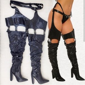 Black snake print thigh high boots with buckles